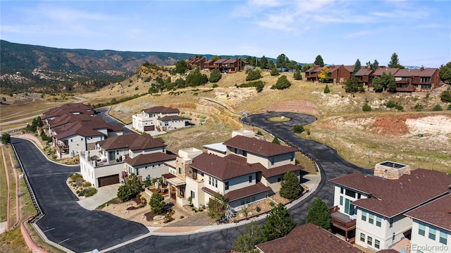 bird's eye view with a residential view and a mountain view