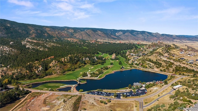 aerial view with a water and mountain view