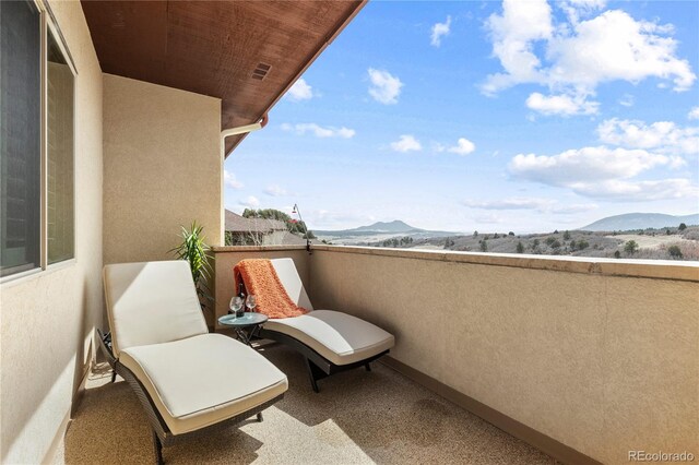 balcony featuring a mountain view