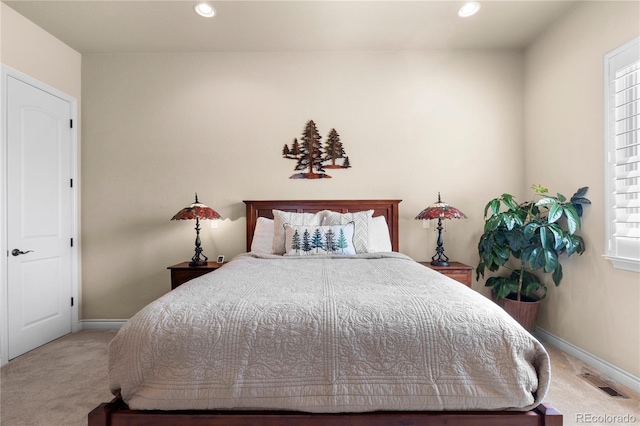 bedroom featuring recessed lighting, carpet, baseboards, and visible vents