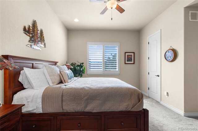 bedroom with light carpet, baseboards, visible vents, and ceiling fan