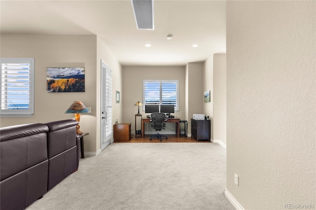 carpeted office space featuring baseboards and recessed lighting