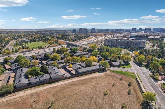 birds eye view of property featuring a city view