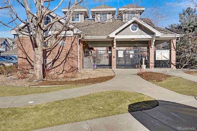 view of property featuring a fenced front yard