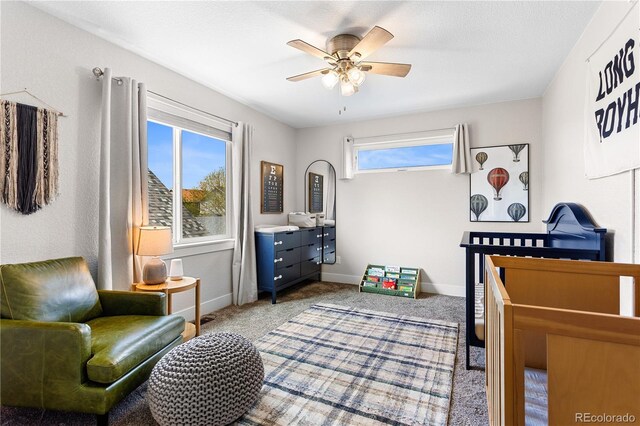 4589 Quandary Peak St, Brighton, CO 80601 - carpeted bedroom featuring baseboards and ceiling fan