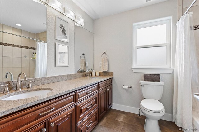 4589 Quandary Peak St, Brighton, CO 80601 - bathroom featuring double vanity, a shower with shower curtain, and tile patterned floors