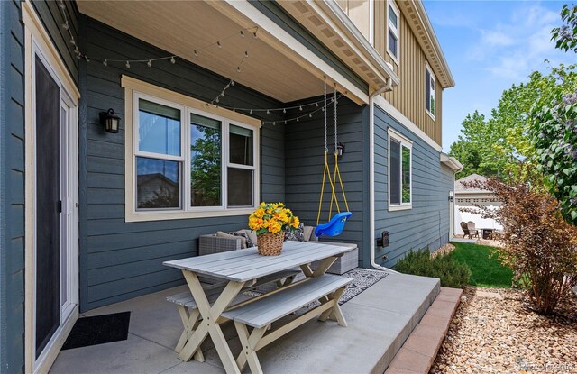 4589 Quandary Peak St, Brighton, CO 80601 - view of patio / terrace featuring outdoor dining area