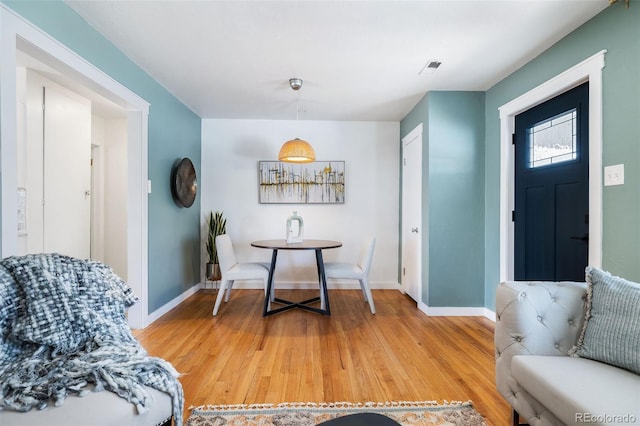 dining area featuring hardwood / wood-style floors