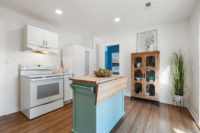 kitchen featuring white appliances, dark hardwood / wood-style floors, a center island, butcher block counters, and white cabinets