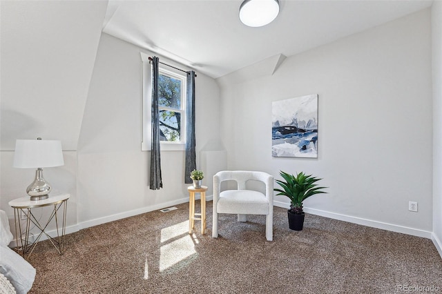 sitting room featuring carpet flooring, visible vents, and baseboards