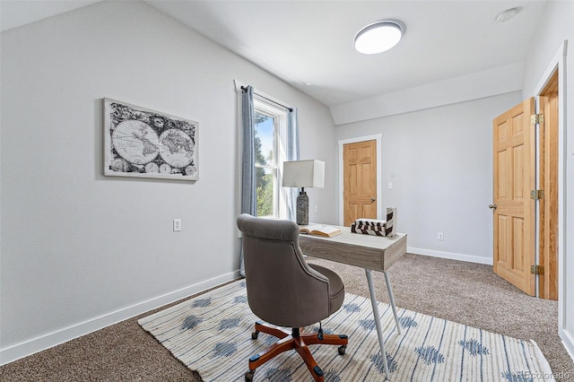 carpeted home office featuring baseboards