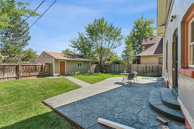 view of yard with a patio area and a fenced backyard