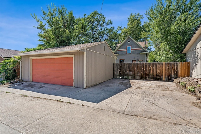 detached garage with fence