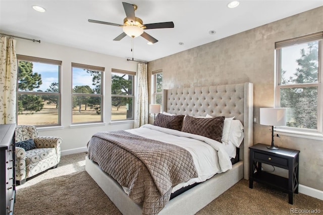 carpeted bedroom featuring recessed lighting, a ceiling fan, and baseboards