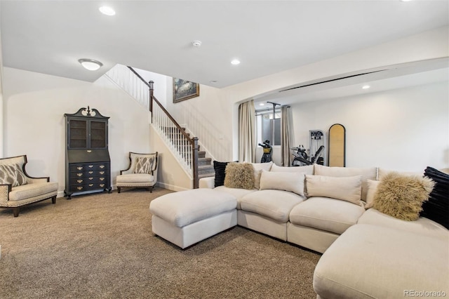 carpeted living room featuring arched walkways, stairway, recessed lighting, and baseboards