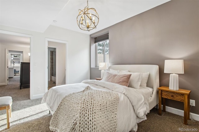 carpeted bedroom featuring baseboards and an inviting chandelier