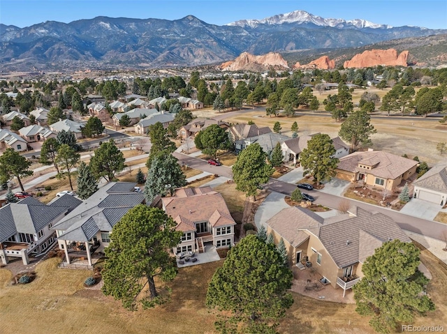 drone / aerial view featuring a mountain view and a residential view