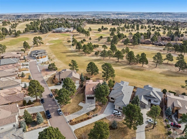 aerial view featuring golf course view and a residential view