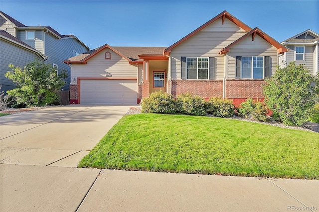 craftsman-style home featuring a front yard and a garage