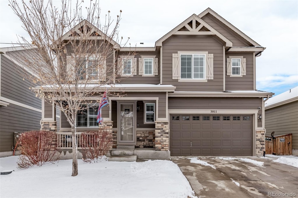 craftsman house with a garage