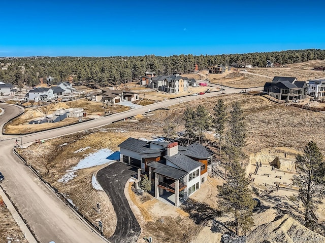 5820 Powell Rd, Parker, CO 80134 - aerial view of residential area with a heavily wooded area