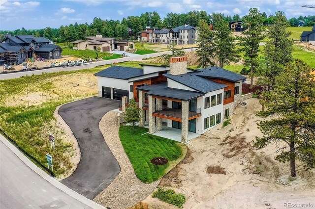 5820 Powell Rd, Parker, CO 80134 - aerial perspective of suburban area with a tree filled landscape