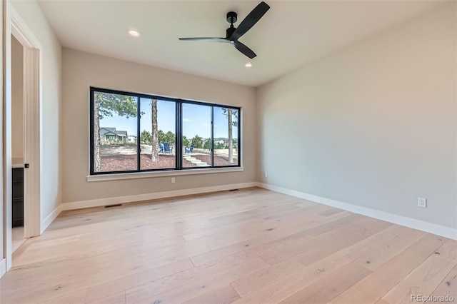 5820 Powell Rd, Parker, CO 80134 - empty room featuring light wood-style floors, a ceiling fan, and recessed lighting