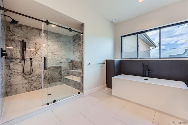 5820 Powell Rd, Parker, CO 80134 - full bathroom with a marble finish shower, a freestanding bath, and tile patterned flooring