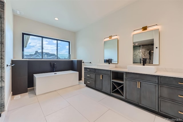 5820 Powell Rd, Parker, CO 80134 - bathroom with double vanity, a freestanding tub, a shower with shower door, and tile patterned flooring