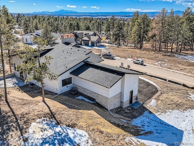 5820 Powell Rd, Parker, CO 80134 - aerial view of property and surrounding area featuring a forest and a mountain backdrop