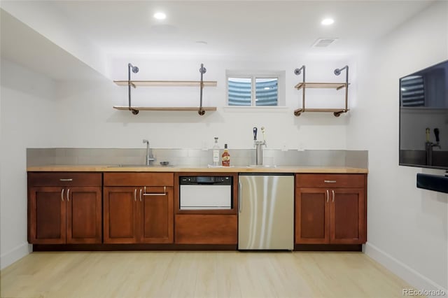 4994 S Independence Way, Littleton, CO 80123 - kitchen featuring fridge, dishwasher, baseboards, a sink, and open shelves
