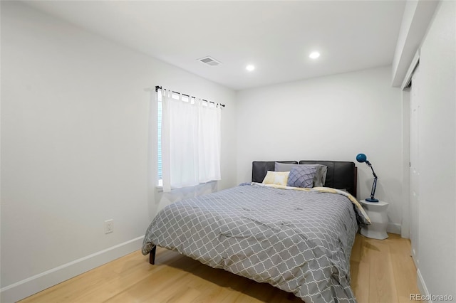4994 S Independence Way, Littleton, CO 80123 - bedroom with wood finished floors, baseboards, and recessed lighting