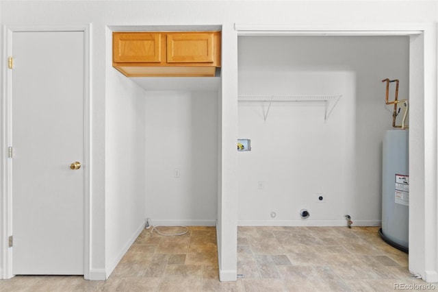 laundry area with electric dryer hookup, cabinets, electric water heater, gas dryer hookup, and hookup for a washing machine