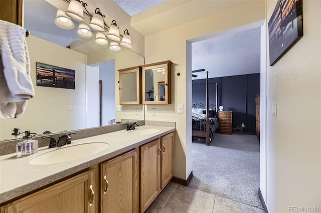 17076 Foxton Dr, Parker, CO 80134 - full bath featuring double vanity, tile patterned flooring, and connected bathroom