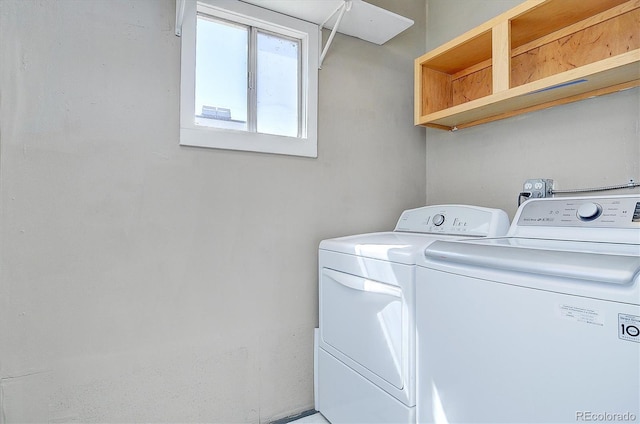 laundry area featuring independent washer and dryer and laundry area