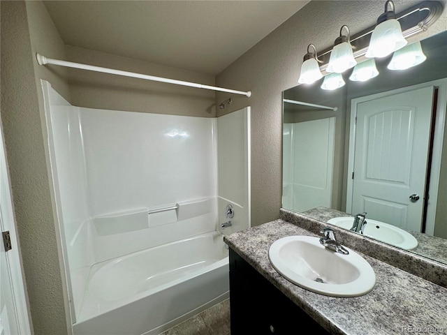 bathroom with vanity and shower / bath combination