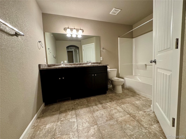 full bathroom featuring vanity, shower / bathtub combination, and toilet