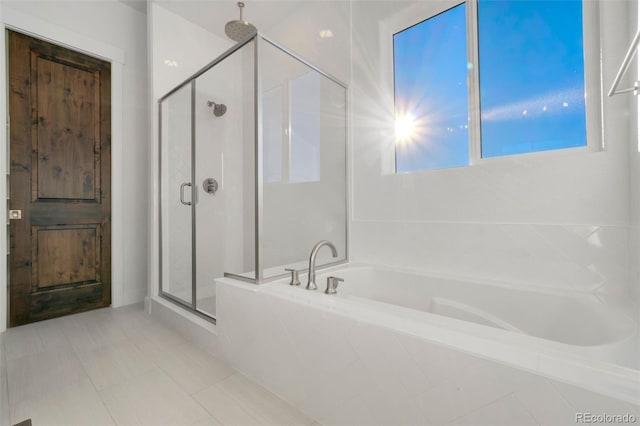 bathroom featuring plus walk in shower