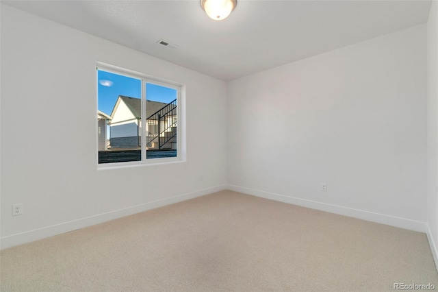 view of carpeted spare room