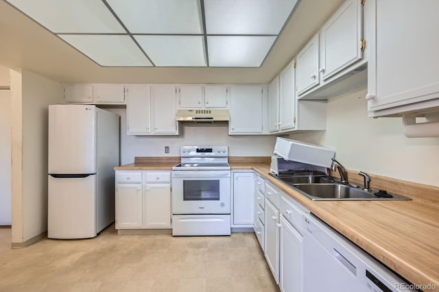 kitchen featuring a sink, white cabinets, white appliances, under cabinet range hood, and light countertops