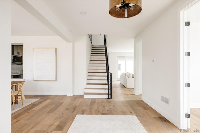 interior space featuring hardwood / wood-style flooring and ceiling fan