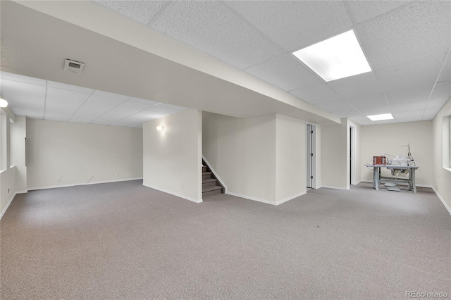 11091 Clayton St, Northglenn, CO 80233 - finished basement with a drop ceiling, carpet flooring, and stairway