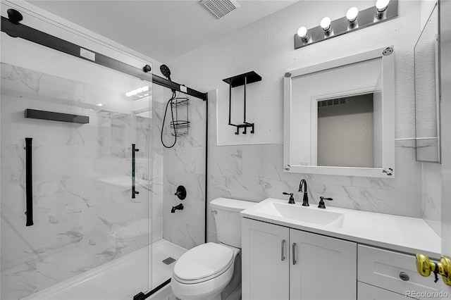 11091 Clayton St, Northglenn, CO 80233 - full bath with a marble finish shower, vanity, and tile walls