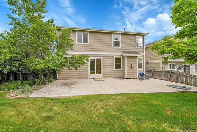 11091 Clayton St, Northglenn, CO 80233 - rear view of house with a patio and a fenced backyard