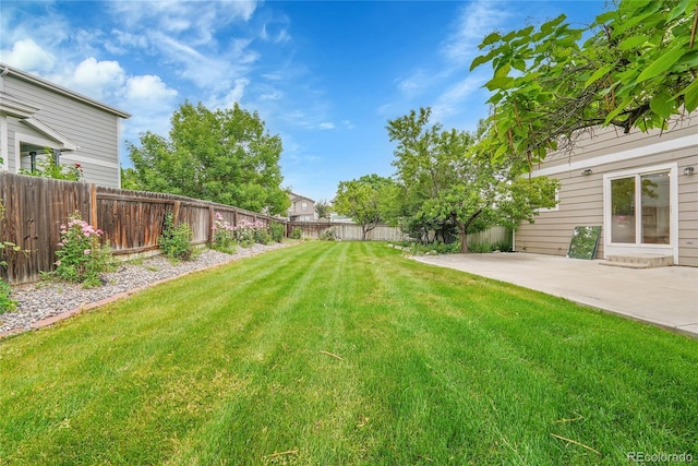 11091 Clayton St, Northglenn, CO 80233 - fenced backyard featuring a patio