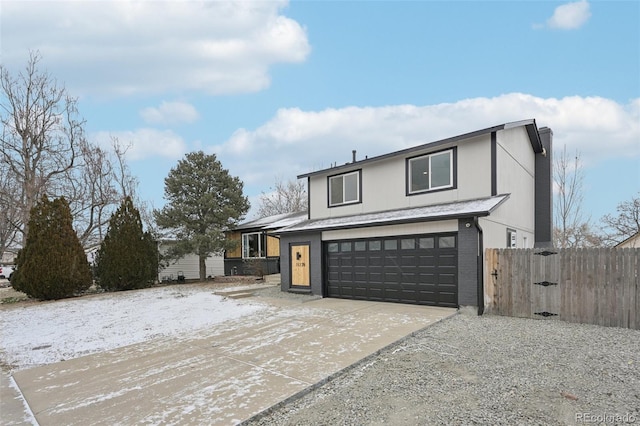 view of front of property featuring a garage