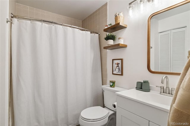 full bath featuring toilet and vanity