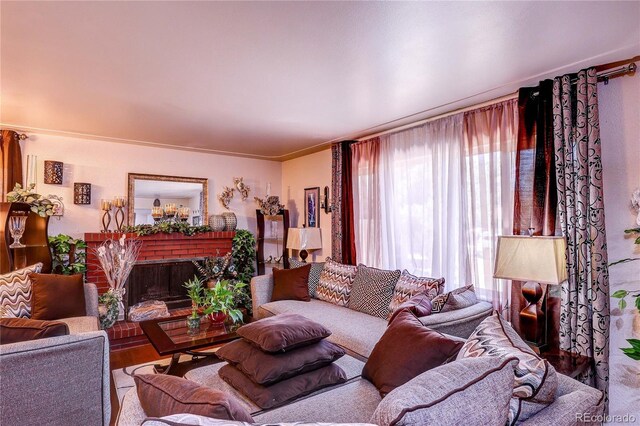 233 Nome St, Aurora, CO 80010 - living area with wood finished floors and a fireplace