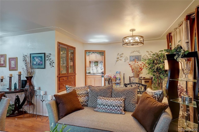 233 Nome St, Aurora, CO 80010 - living room with a chandelier and wood finished floors