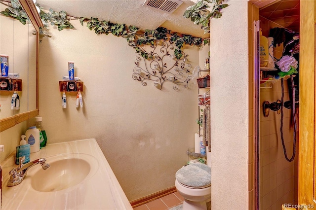 233 Nome St, Aurora, CO 80010 - full bath with vanity and tiled shower